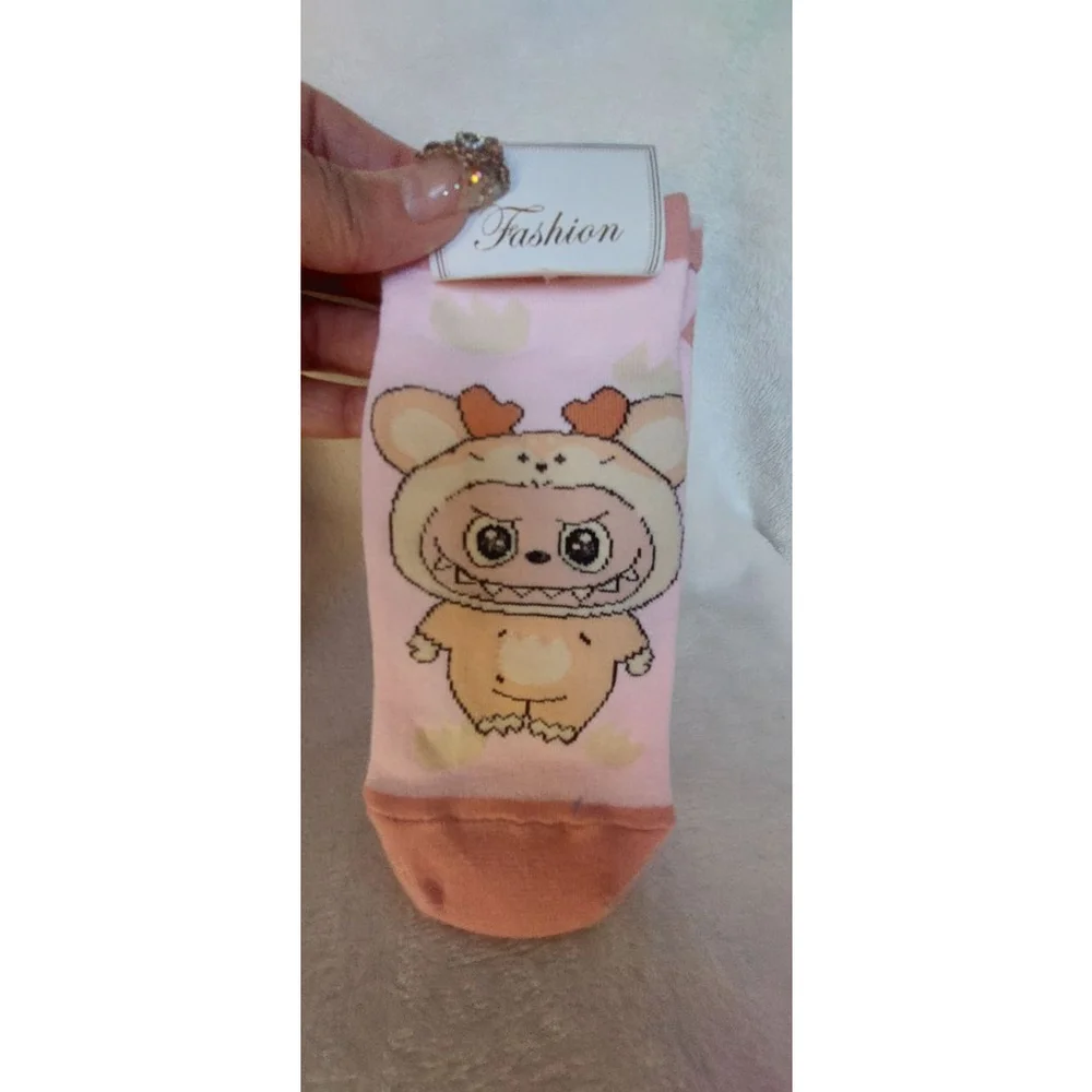 5 pairs of the ugly but cute Labubu Character footies Socks.